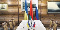 В стол переговоров